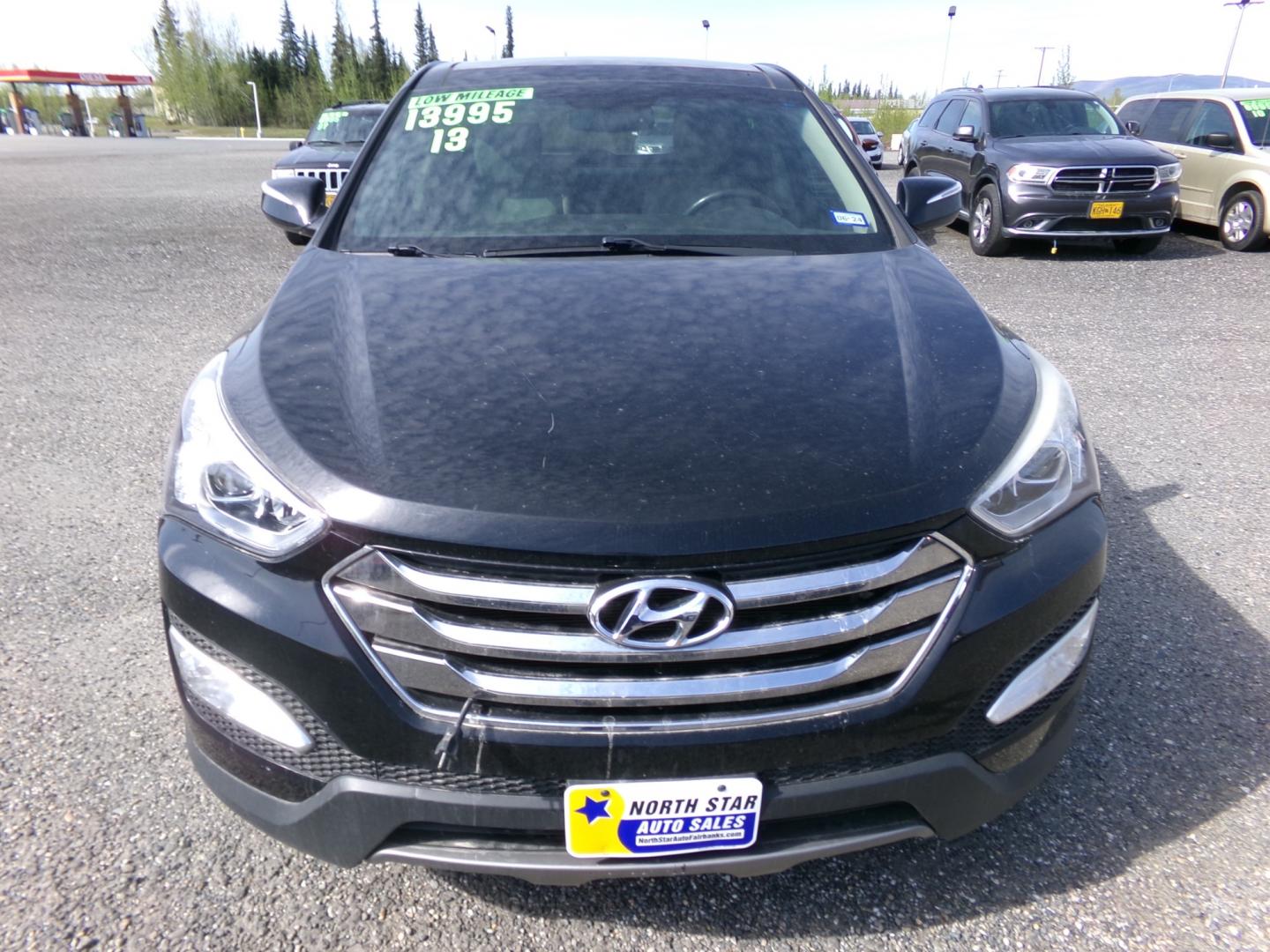 2013 Black Hyundai Santa Fe Sport 2.4 FWD (5XYZU3LB9DG) with an 2.4L L4 DOHC 16V engine, 6-Speed Automatic transmission, located at 2630 Philips Field Rd., Fairbanks, AK, 99709, (907) 458-0593, 64.848068, -147.780609 - Photo#1